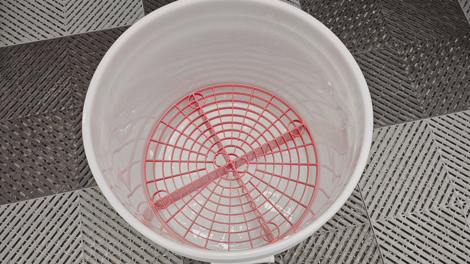 grit guard inside car wash bucket for safer washing process