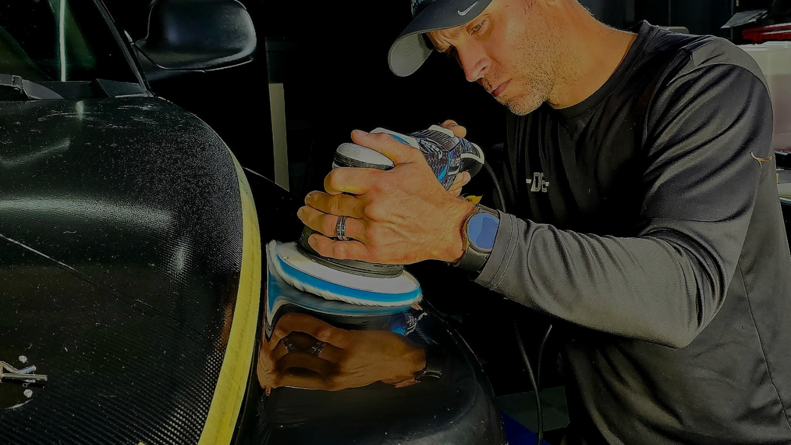 paint correction polishing removing swirl marks from black vehicle paint